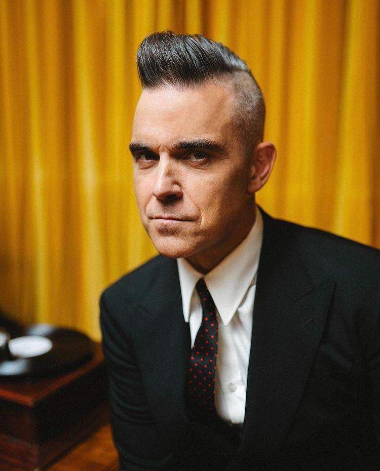 Robbie Williams a fost diagnosticat cu COVID-19! Cântărețul s-a izolat într-o vilă de lux!
